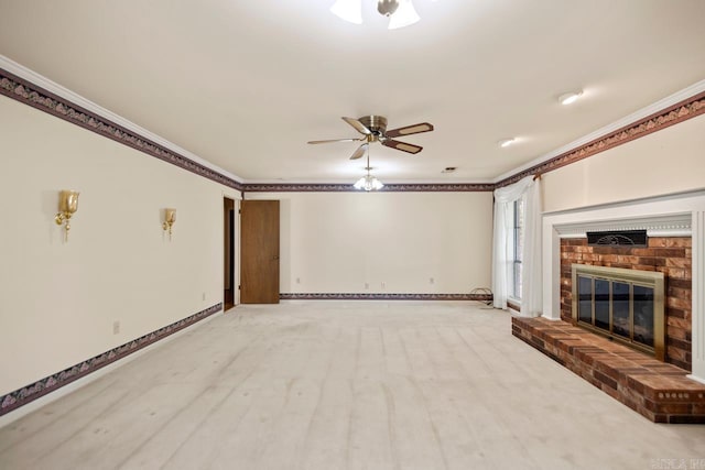 unfurnished living room with a fireplace, crown molding, and ceiling fan
