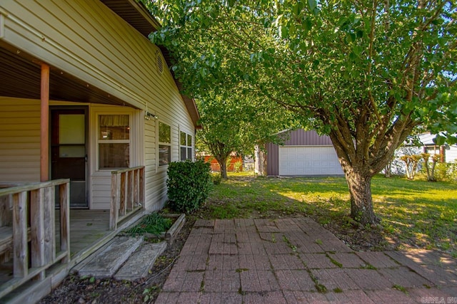 exterior space featuring an outdoor structure and a garage