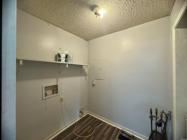 laundry area featuring hookup for a washing machine, a textured ceiling, electric panel, dark wood finished floors, and laundry area