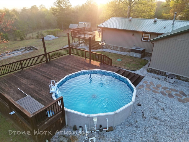 view of pool with a deck