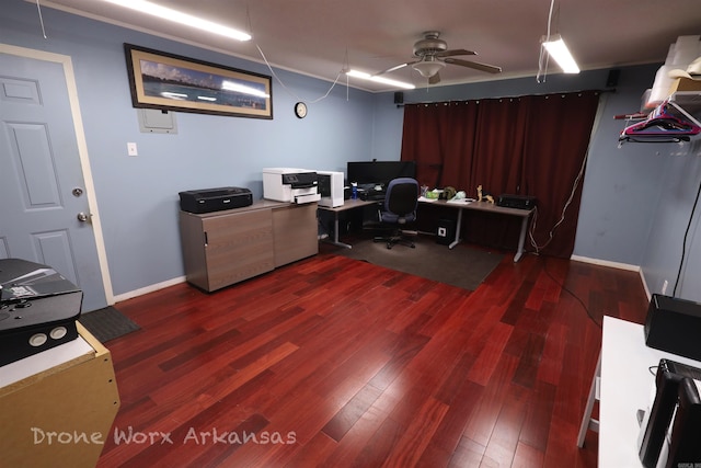 office featuring wood finished floors, a ceiling fan, and baseboards