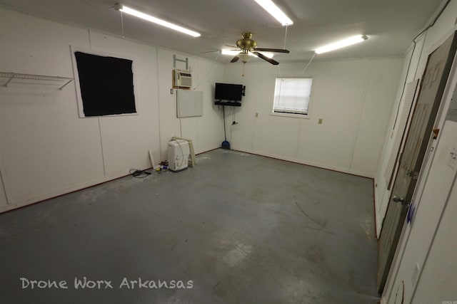 garage with ceiling fan and a wall unit AC