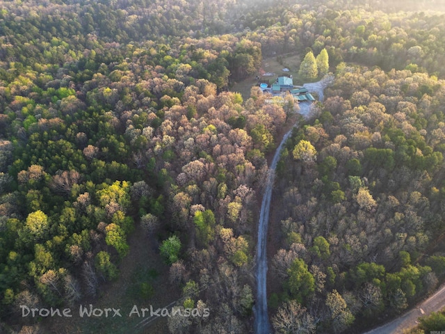 bird's eye view featuring a view of trees