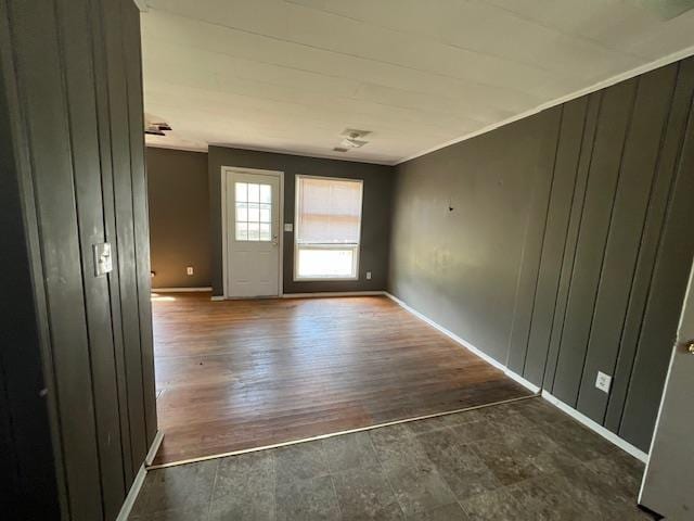interior space featuring baseboards