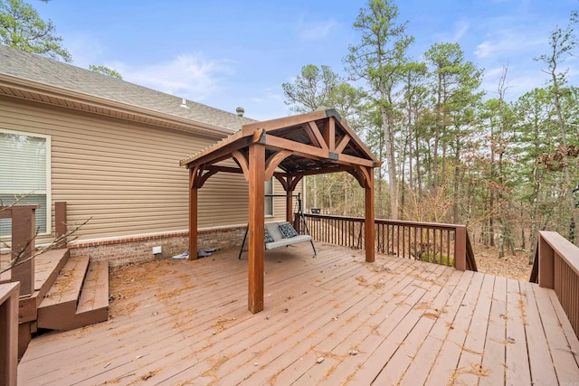 wooden deck featuring a gazebo