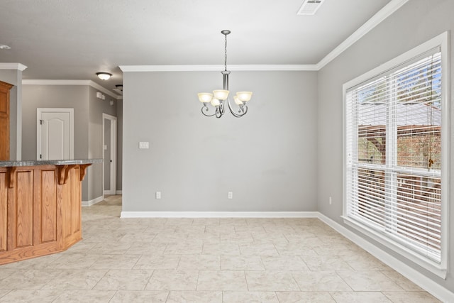 unfurnished room with visible vents, crown molding, baseboards, and a notable chandelier