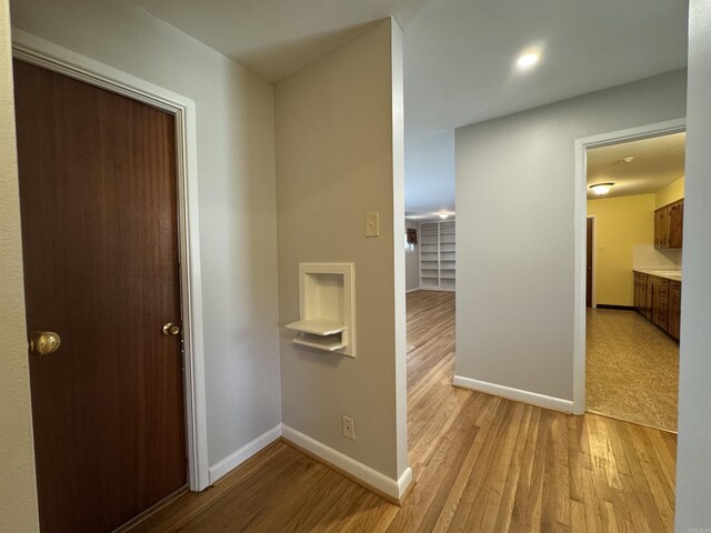 21 Belmont Dr, Little Rock, AR 72204 - corridor with baseboards and light wood-type flooring