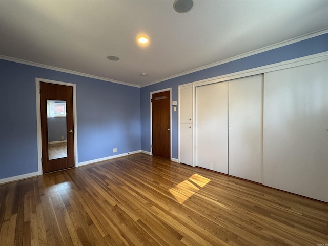 21 Belmont Dr, Little Rock, AR 72204 - unfurnished bedroom featuring baseboards, wood finished floors, and crown molding