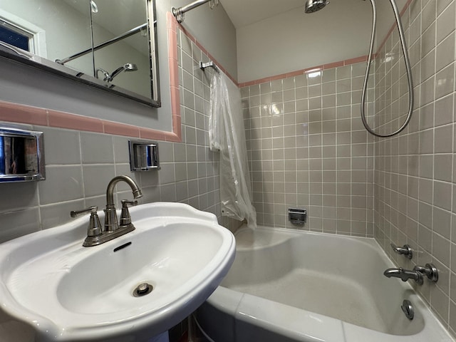 21 Belmont Dr, Little Rock, AR 72204 - full bathroom with tile walls, tasteful backsplash, a sink, and shower / bathtub combination with curtain