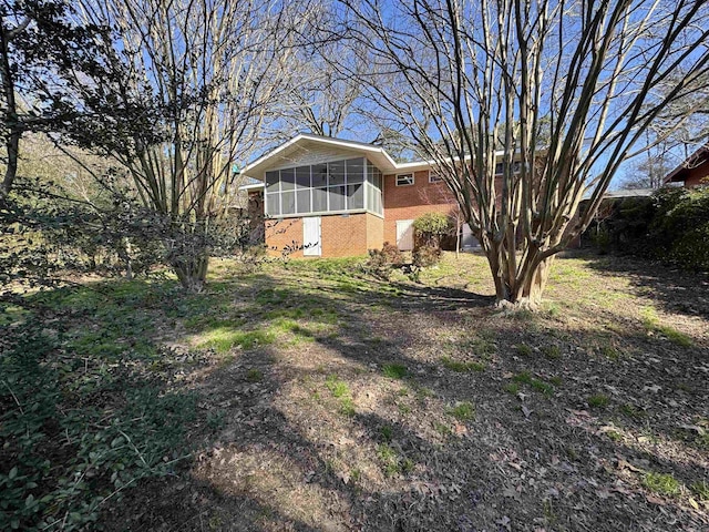 21 Belmont Dr, Little Rock, AR 72204 - view of yard featuring a sunroom