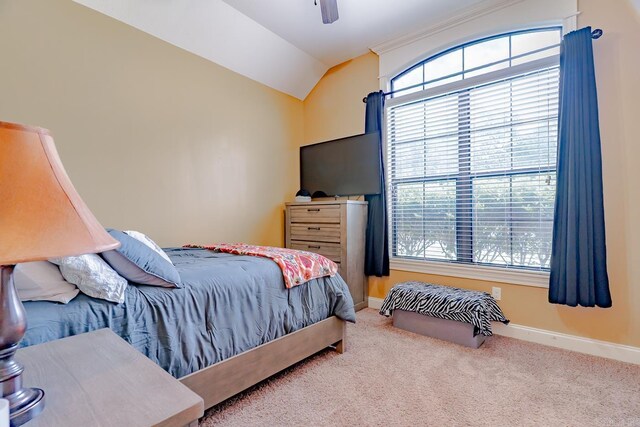 6037 Beaver Creek Ln, Jones Creek, AR 72404 - carpeted bedroom featuring vaulted ceiling, baseboards, and a ceiling fan
