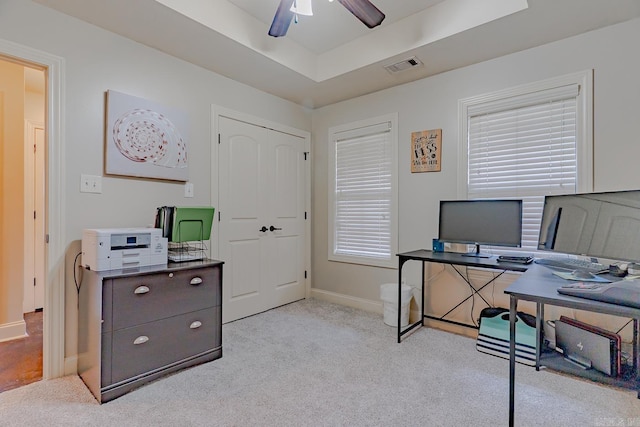 6037 Beaver Creek Ln, Jones Creek, AR 72404 - office space with a raised ceiling, visible vents, baseboards, light colored carpet, and ceiling fan