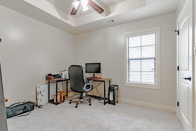 6037 Beaver Creek Ln, Jones Creek, AR 72404 - home office featuring carpet flooring, a wealth of natural light, visible vents, a ceiling fan, and a raised ceiling
