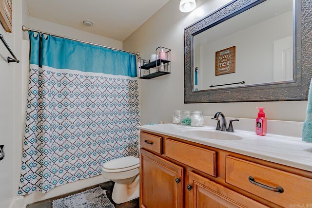 6037 Beaver Creek Ln, Jones Creek, AR 72404 - full bathroom with vanity, curtained shower, and toilet