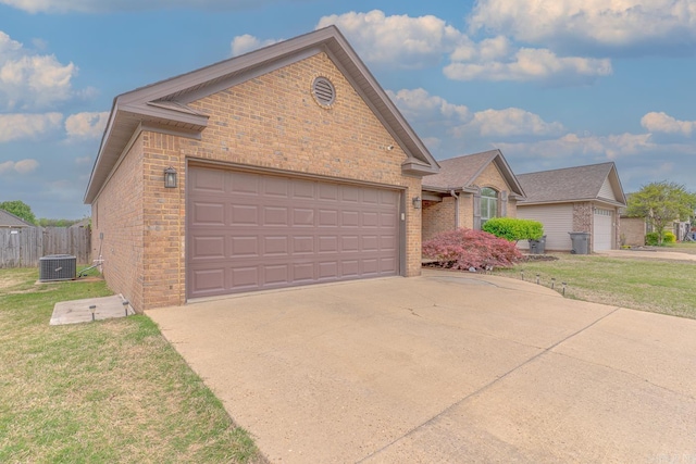 6037 Beaver Creek Ln, Jones Creek, AR 72404 - ranch-style home with a front lawn, cooling unit, driveway, brick siding, and an attached garage