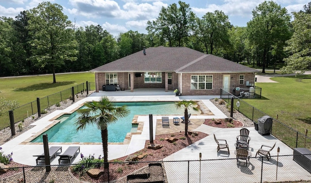 view of pool with a lawn, a fenced backyard, a patio, and a fenced in pool