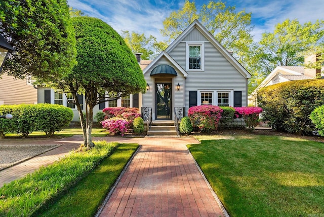 5715 Hawthorne Rd, Little Rock, AR 72207 - view of front of house featuring a front lawn