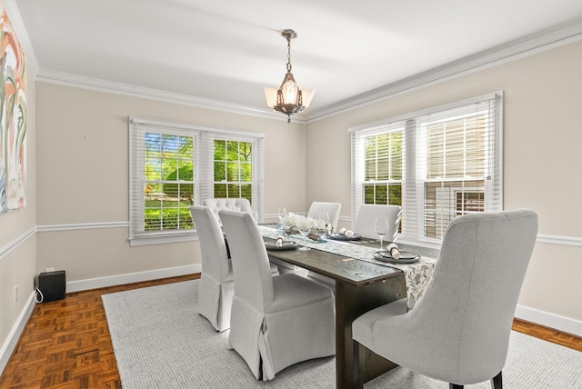 5715 Hawthorne Rd, Little Rock, AR 72207 - dining room featuring baseboards, a wealth of natural light, a chandelier, and ornamental molding