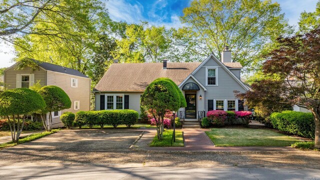 5715 Hawthorne Rd, Little Rock, AR 72207 - view of front of home featuring a chimney and a shingled roof