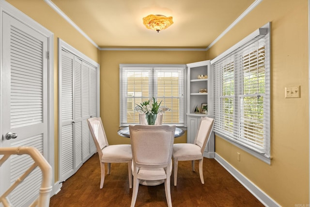 5715 Hawthorne Rd, Little Rock, AR 72207 - dining room featuring baseboards, crown molding, and a wealth of natural light