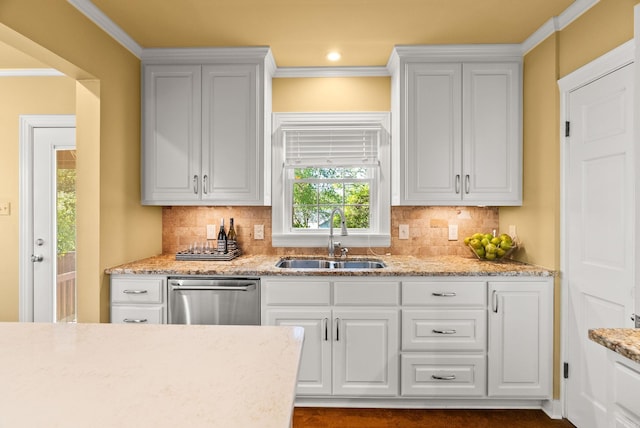 5715 Hawthorne Rd, Little Rock, AR 72207 - kitchen with dishwasher, white cabinetry, decorative backsplash, and a sink