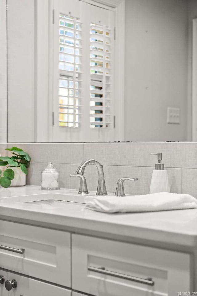 5715 Hawthorne Rd, Little Rock, AR 72207 - bathroom with tasteful backsplash and vanity