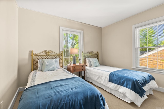 5715 Hawthorne Rd, Little Rock, AR 72207 - bedroom with baseboards, ornamental molding, and carpet