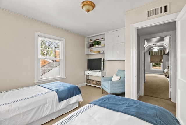 5715 Hawthorne Rd, Little Rock, AR 72207 - carpeted bedroom featuring baseboards, visible vents, and multiple windows