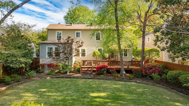 5715 Hawthorne Rd, Little Rock, AR 72207 - back of house featuring fence, a lawn, and a deck