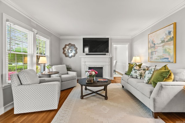 5715 Hawthorne Rd, Little Rock, AR 72207 - living room with wood finished floors, a high end fireplace, and crown molding