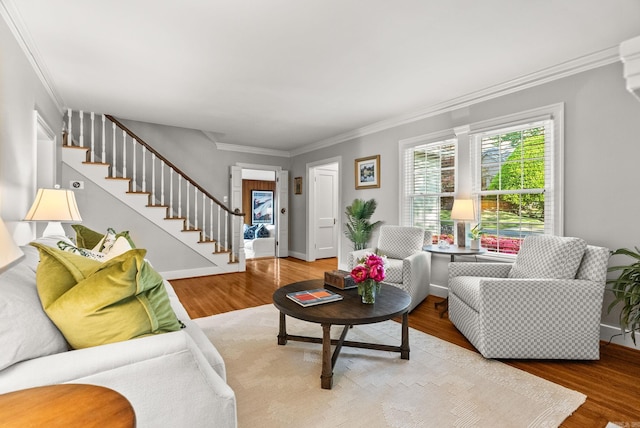 5715 Hawthorne Rd, Little Rock, AR 72207 - living area with stairway, ornamental molding, baseboards, and wood finished floors