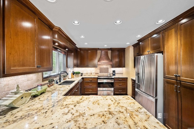 138 Silver Point Dr Unit 14, Mount Ida, AR 71957 - kitchen featuring recessed lighting, light stone counters, stainless steel appliances, a sink, and custom exhaust hood