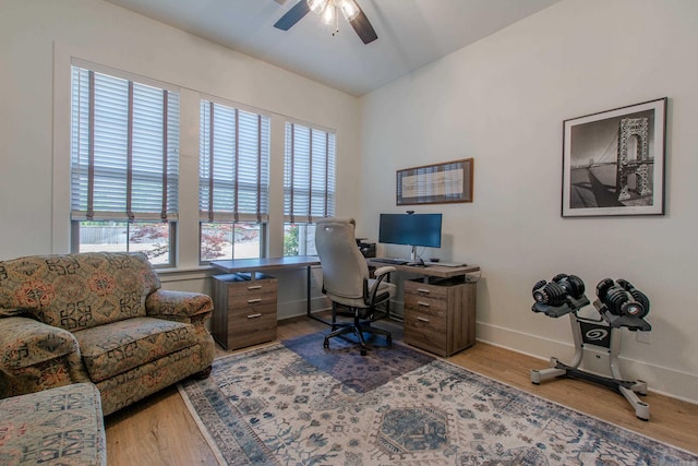 4941 Lake Vista Dr, Benton, AR 72019 - home office with wood finished floors, baseboards, and ceiling fan