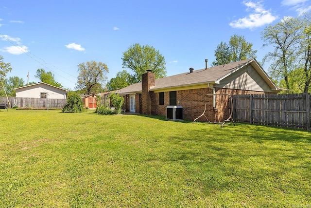 15 Falcon Dr, Sherwood, AR 72120 - exterior space featuring central AC and a fenced backyard