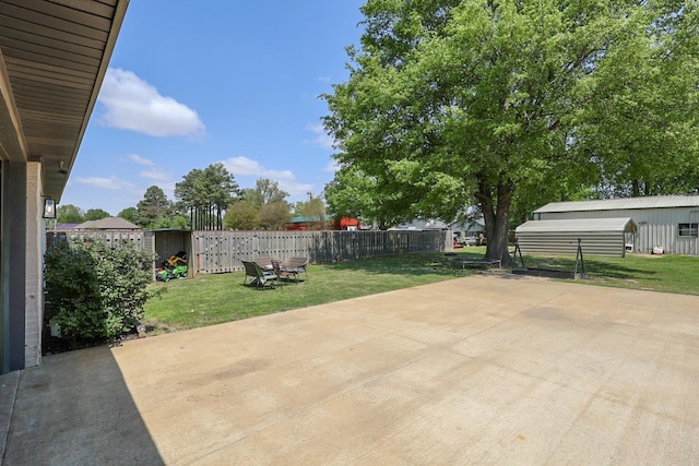 view of patio featuring fence