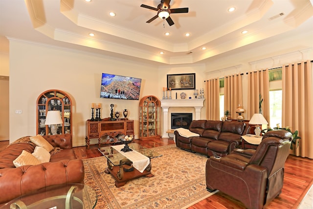 2780 Shoemaker Rd, Sheridan, AR 72150 - living area with visible vents, recessed lighting, a ceiling fan, wood finished floors, and a raised ceiling