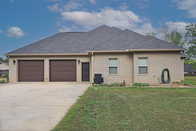 2780 Shoemaker Rd, Sheridan, AR 72150 - view of front of property with brick siding, driveway, and a garage