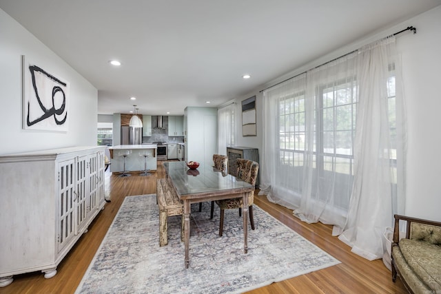 4305 Arlington Dr, North Little Rock, AR 72116 - dining room with wood finished floors and recessed lighting