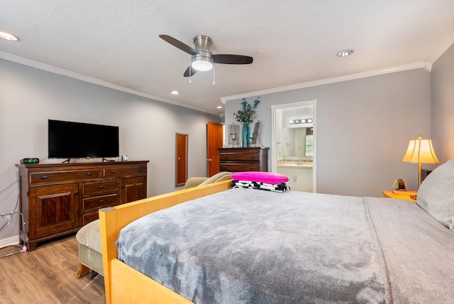 7803 Ascension Rd, Little Rock, AR 72204 - bedroom featuring recessed lighting, wood finished floors, ornamental molding, and ensuite bathroom