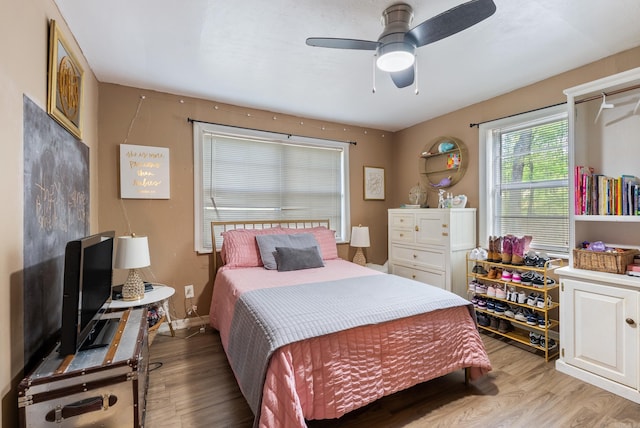 7803 Ascension Rd, Little Rock, AR 72204 - bedroom with light wood-type flooring and a ceiling fan
