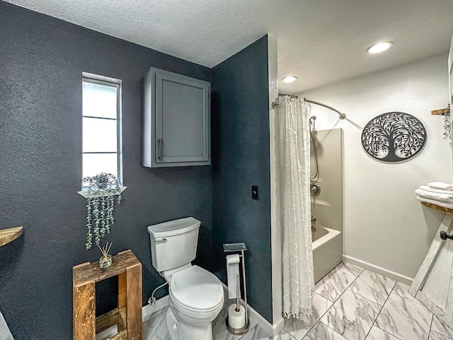 bathroom with marble finish floor, shower / bath combo with shower curtain, toilet, and baseboards