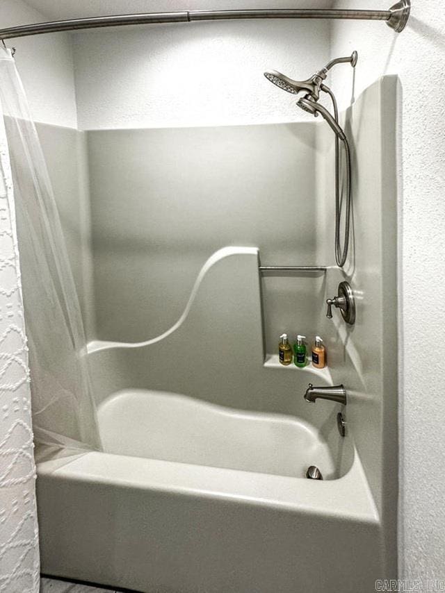 full bathroom with bathtub / shower combination