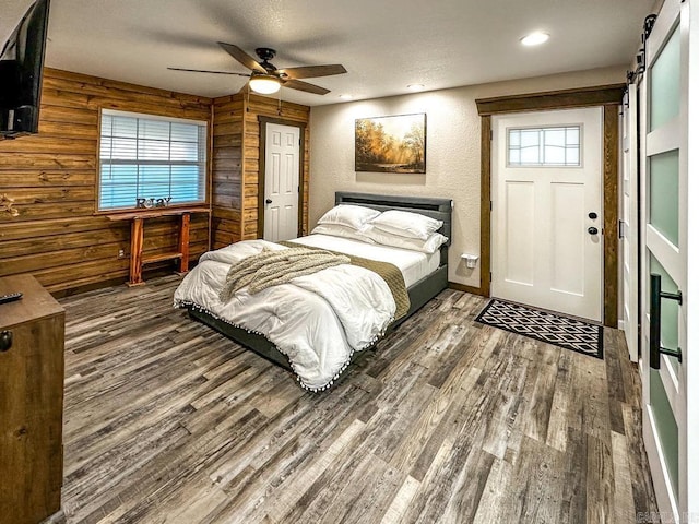bedroom with recessed lighting, wood finished floors, baseboards, and ceiling fan