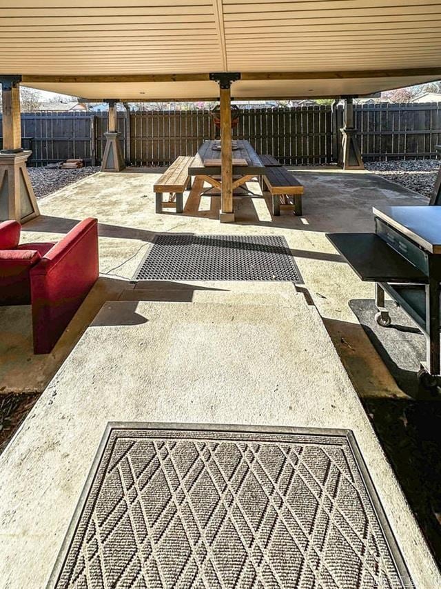 view of patio / terrace featuring outdoor dining area and a fenced backyard