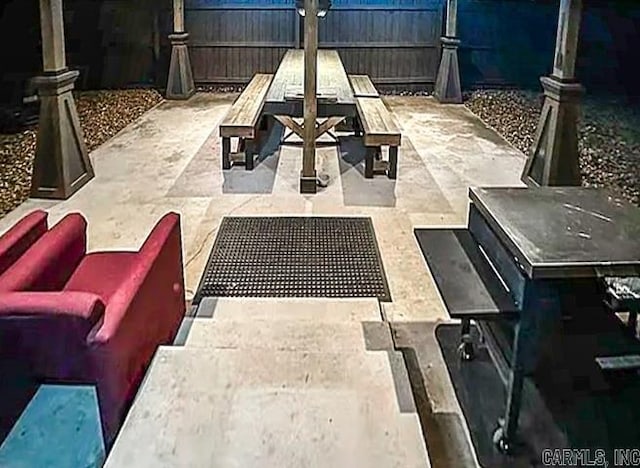 view of patio featuring outdoor lounge area, outdoor dining area, and fence