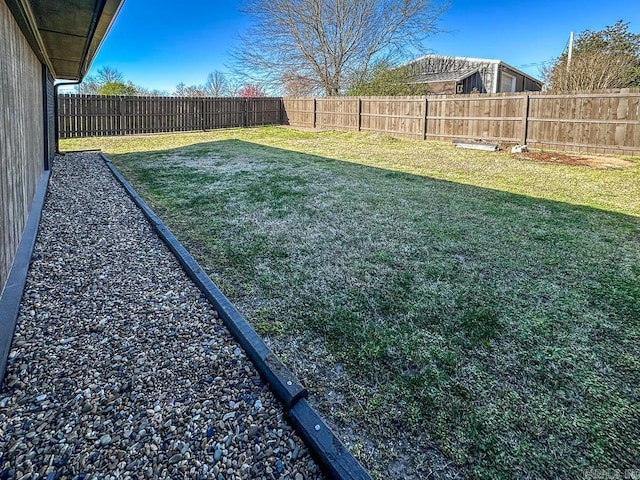 view of yard featuring a fenced backyard