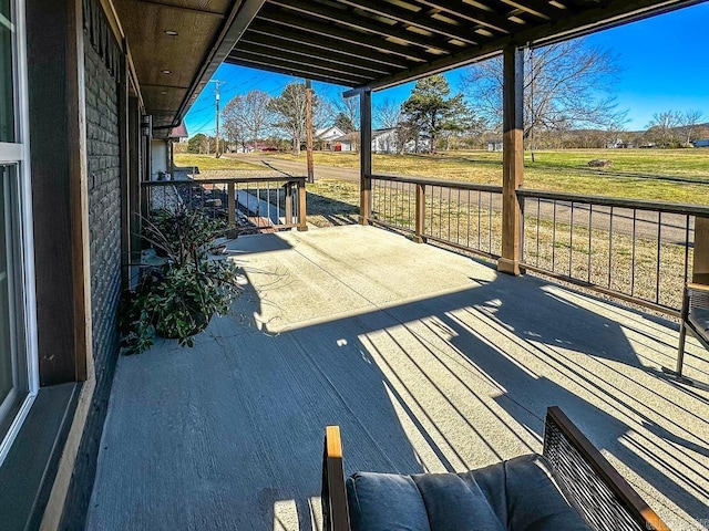 deck featuring a lawn