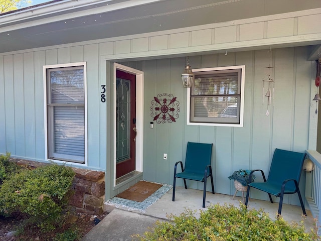 entrance to property with a porch