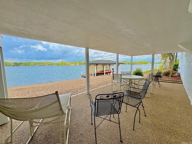 view of patio / terrace with a water view