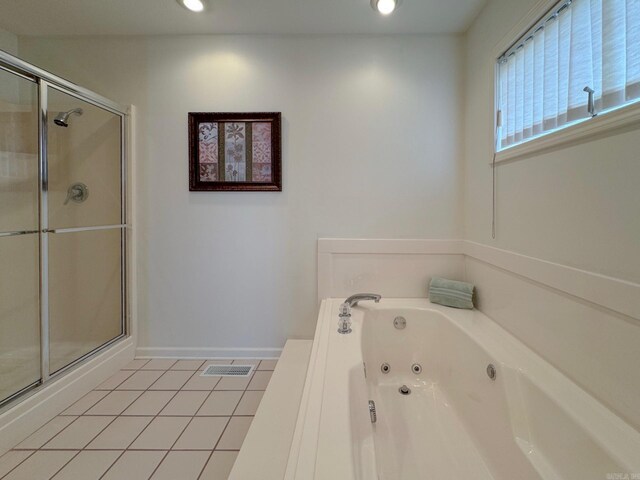 bathroom with baseboards, visible vents, a whirlpool tub, tile patterned flooring, and a shower stall